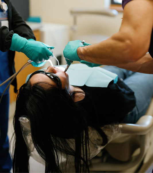 Dental patient having teeth cleaned