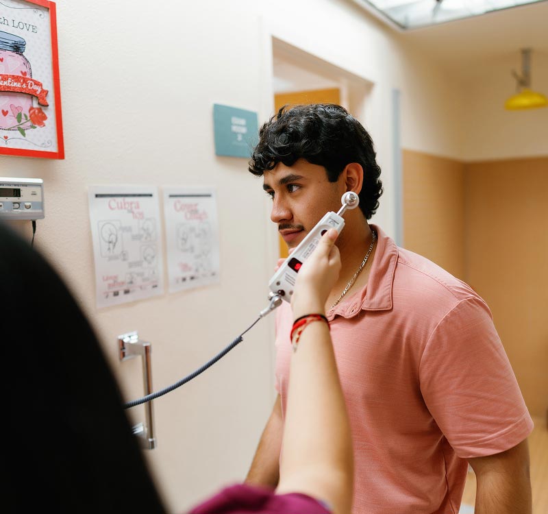 Patient getting temperature taken