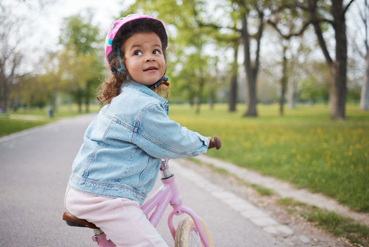 Little girl on bike
